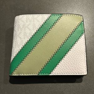 NWT MK mens wallet with coin pouch.